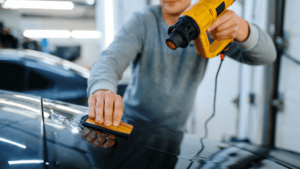 Removing the sticker from your car using heat gun