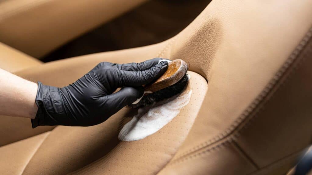 How to clean vomit out of perforated leather seats